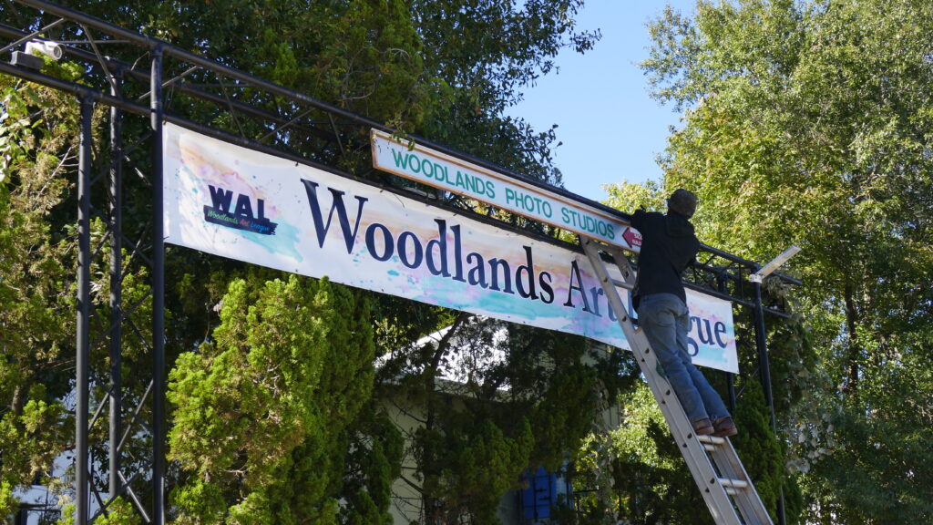 Woodlands Creative Co-Op sign